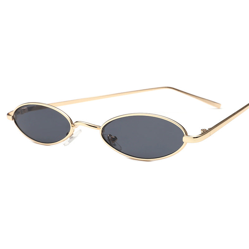 Dame elegant solbrille i oval metallramme Skanto