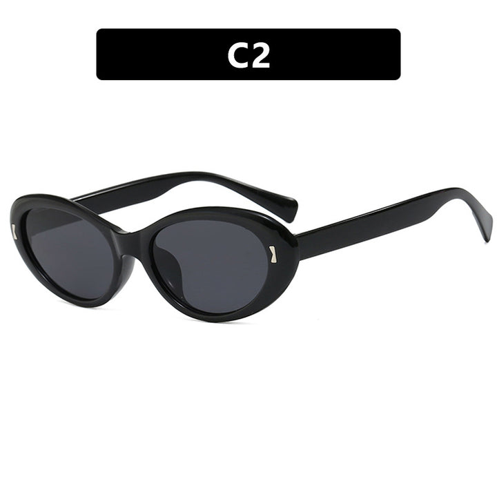 Dame Cat-Eye solbriller med beskyttende UV-filter og stilfull ramme Skanto
