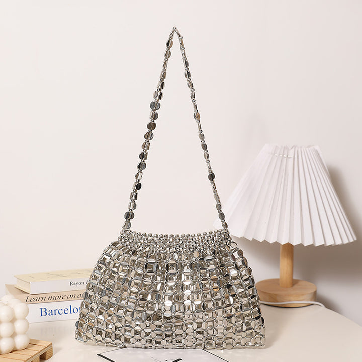 Moderne skulderveske i glitrende design Skanto