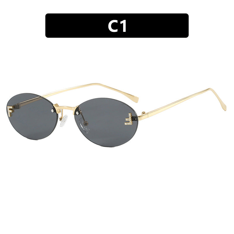 Dame mote trendy solbriller med elegante, runde glass og filigran metallramme Skanto