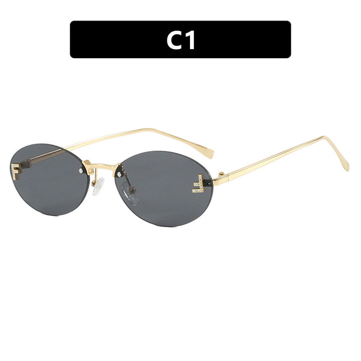 Dame mote trendy solbriller med elegante, runde glass og filigran metallramme Skanto