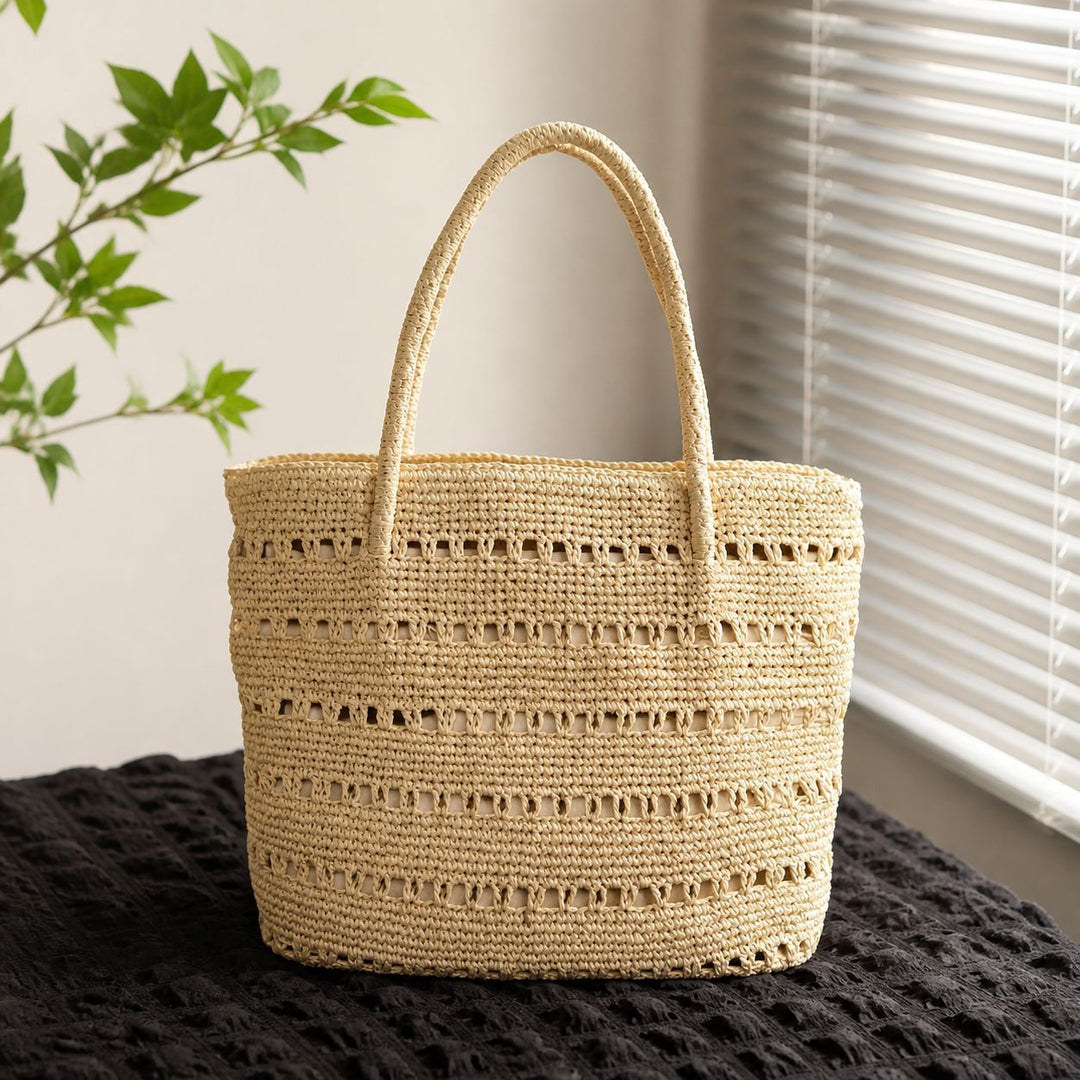 Håndlaget strandveske med åpen vevemønster Skanto