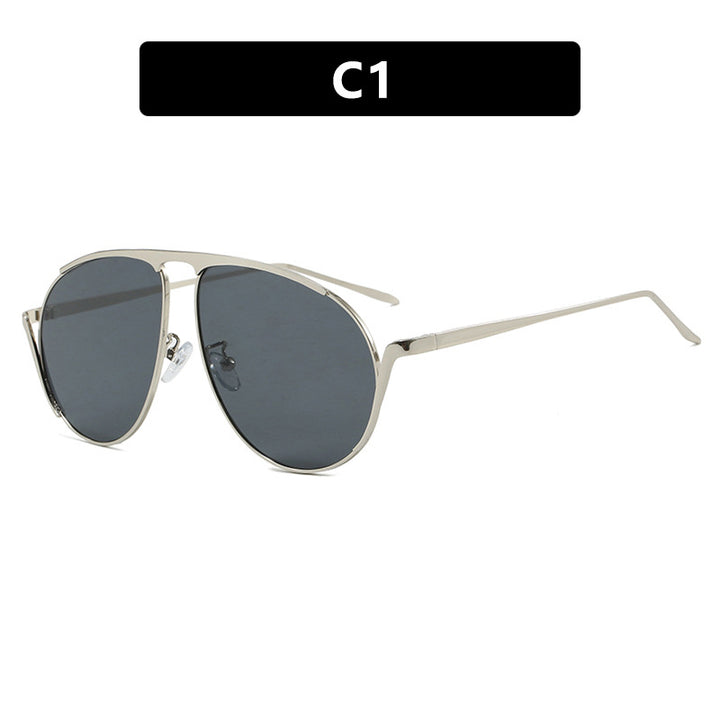 Dame moteriktig pilot-solbrille med polariserte linser og elegant metallramme Skanto