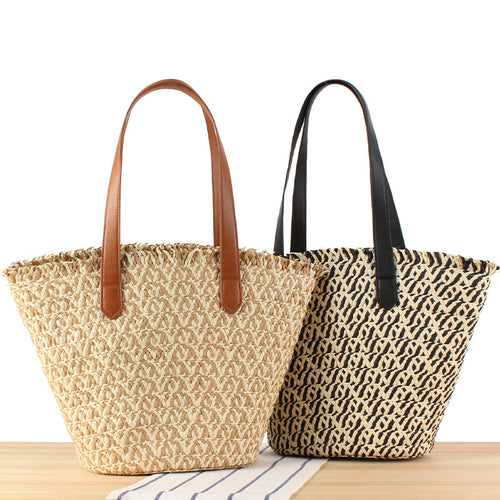 Stylish leisure handbag made of braided natural material Skanto