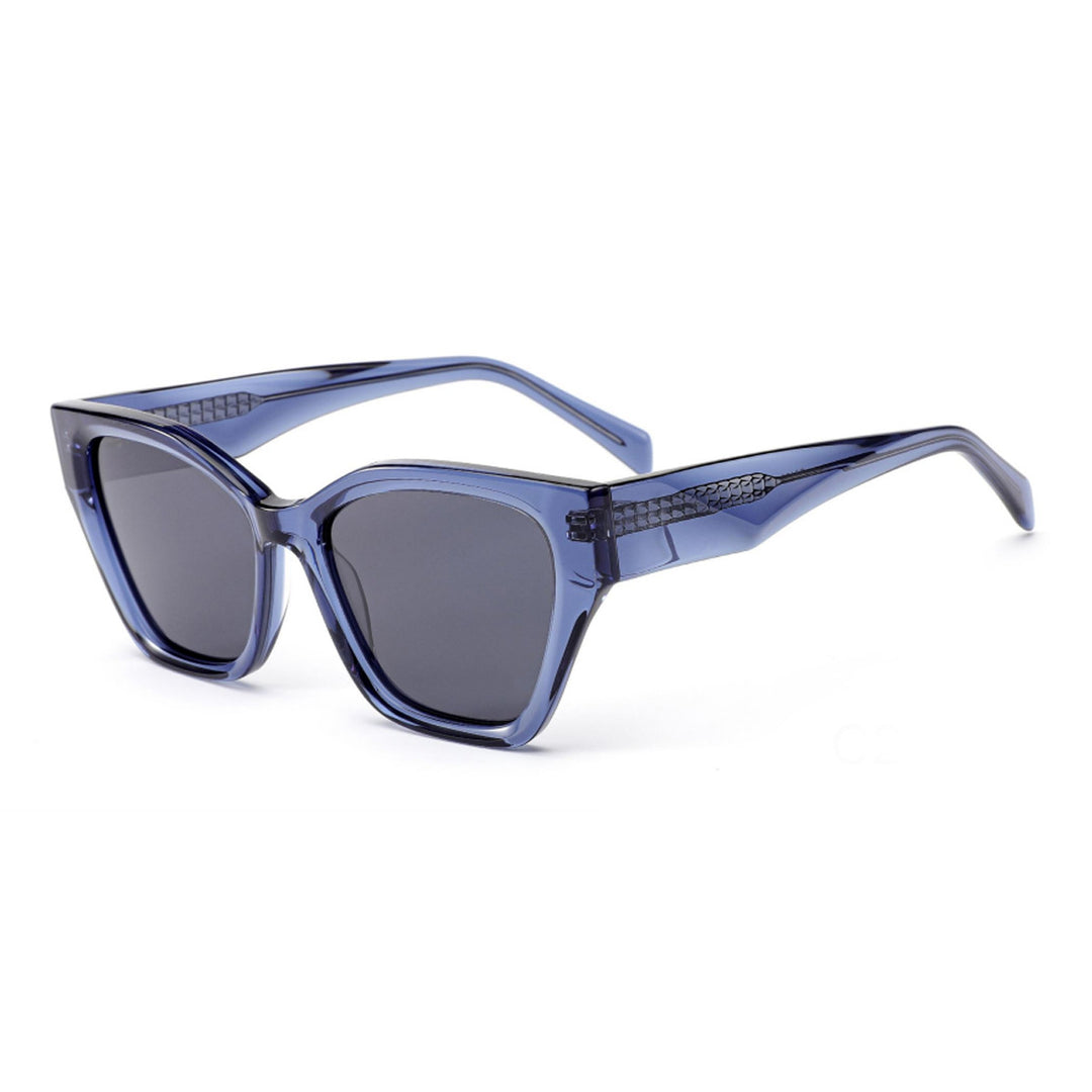 Dame solbrille med moderne ramme og lekne detaljer Skanto
