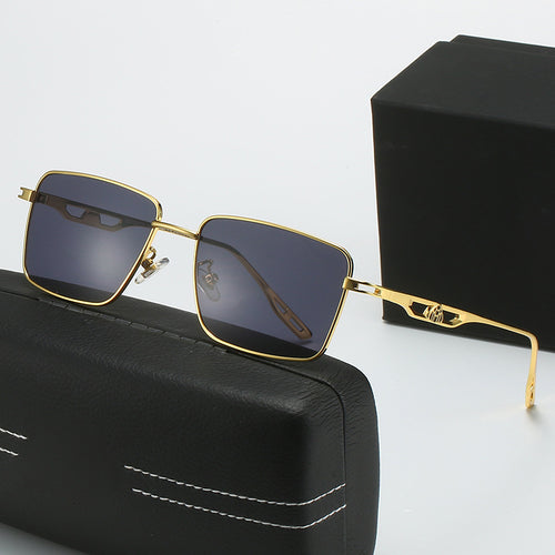 Dame luksus solbrille med markant geometrisk ramme og polarisert glass Skanto