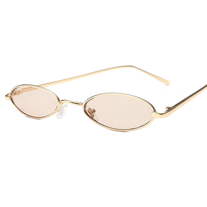 Dame elegant solbrille i oval metallramme Skanto