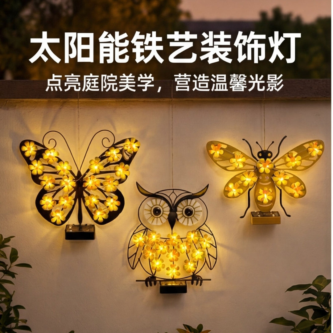 Decorative Metal Bee Wall Light with Integrated Fairy LED Lamp and Solar Module Skanto
