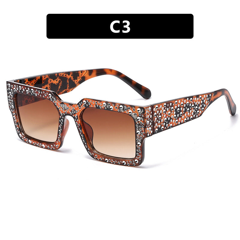 Dame ekstravagant solbrille med glitrende aksent Skanto