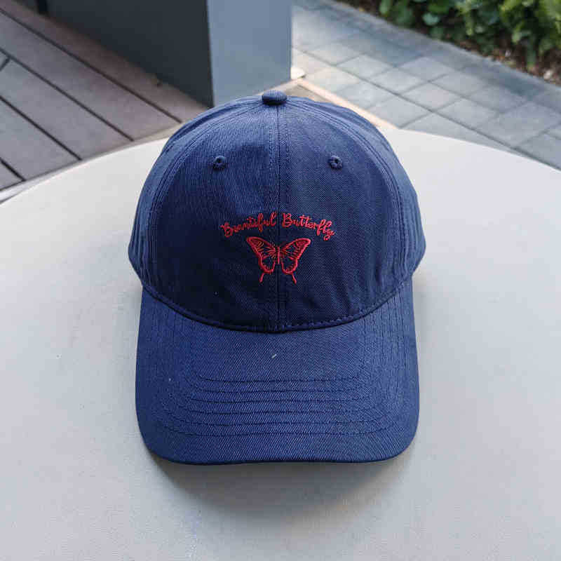 Kvinnens broderte sommerfugl caps Skanto