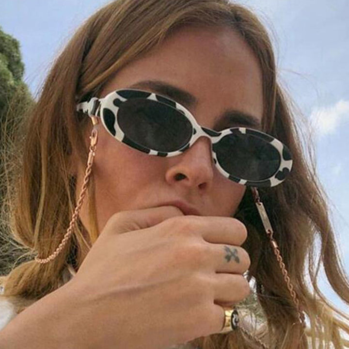 Dame moteriske Cat-Eye solbriller med UV-beskyttelse og robust ramme Skanto