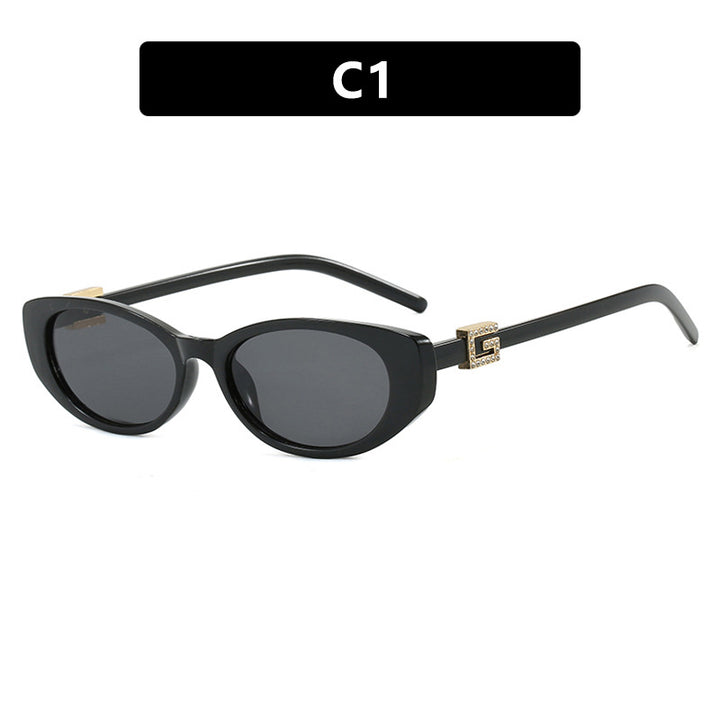 Damer cat-eye solbrille med elegant metallramme og beskyttende UV-filter Skanto