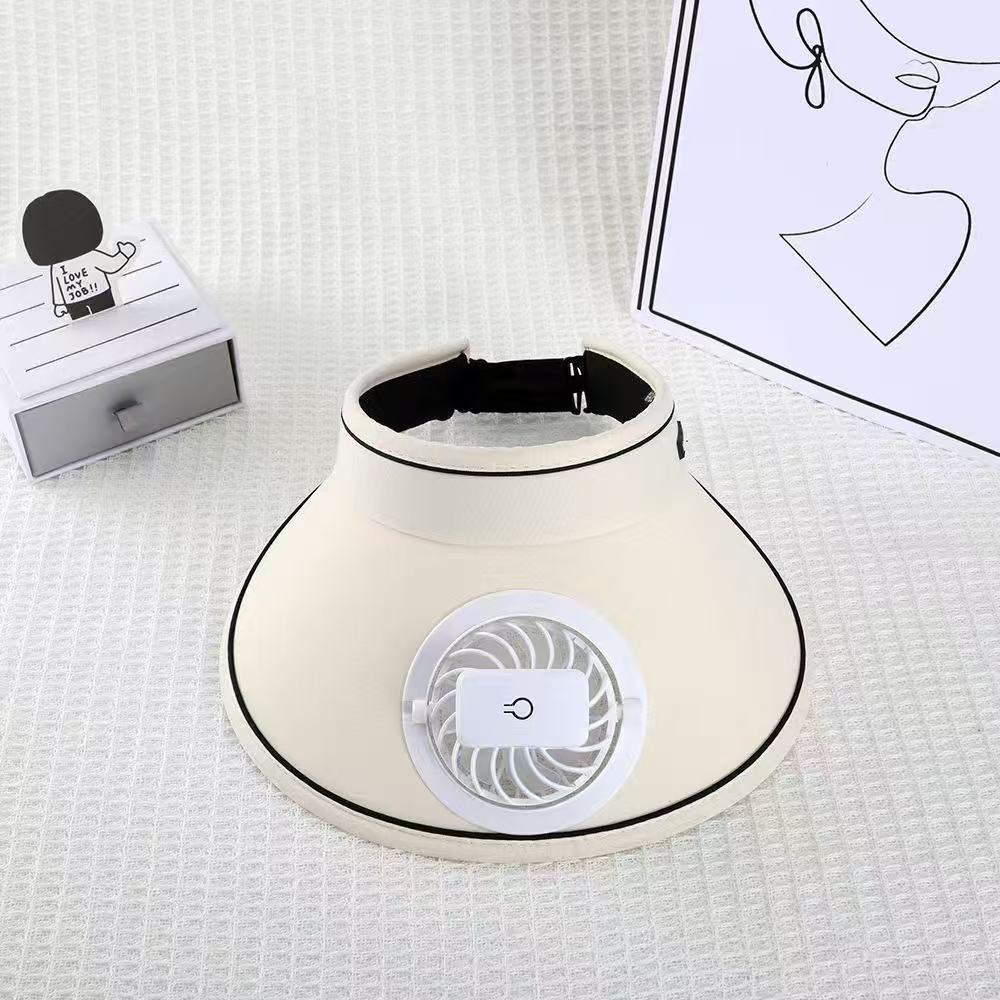 Visor with detachable USB fan, adjustable headband, and breathable UV protection Skanto