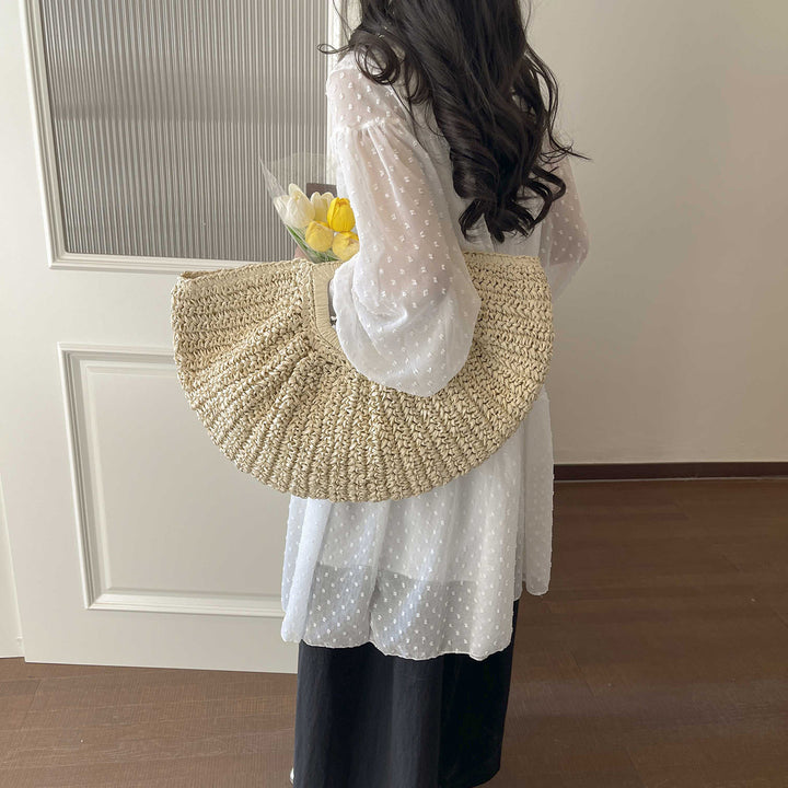 Håndlaget bastkurv med elegante folder Skanto