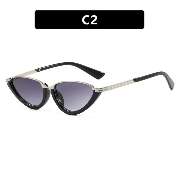 Dame futuristiske Cat-Eye solbriller med gyldne detaljer Skanto