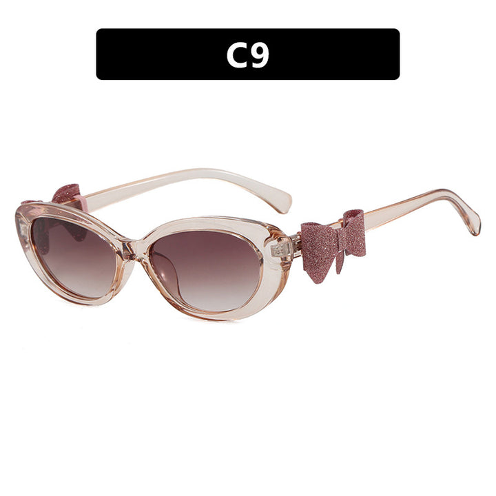 Dame moteriktig solbrille med lekent sløyfedesign Skanto