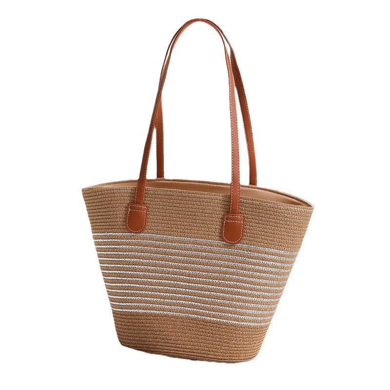 Elegant Bastbag med skinnaksenter Skanto