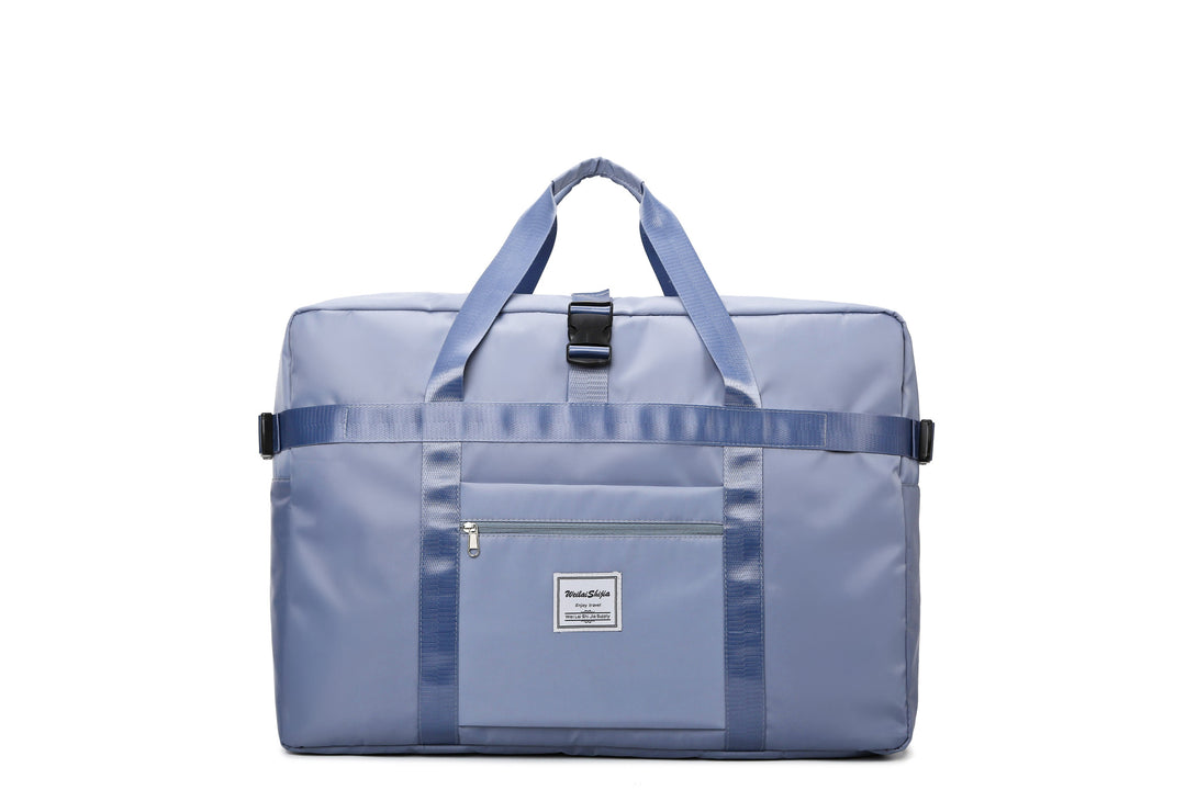 Stort sports-duffelbag med slitesterkt yttermateriale og smart rominndeling Skanto