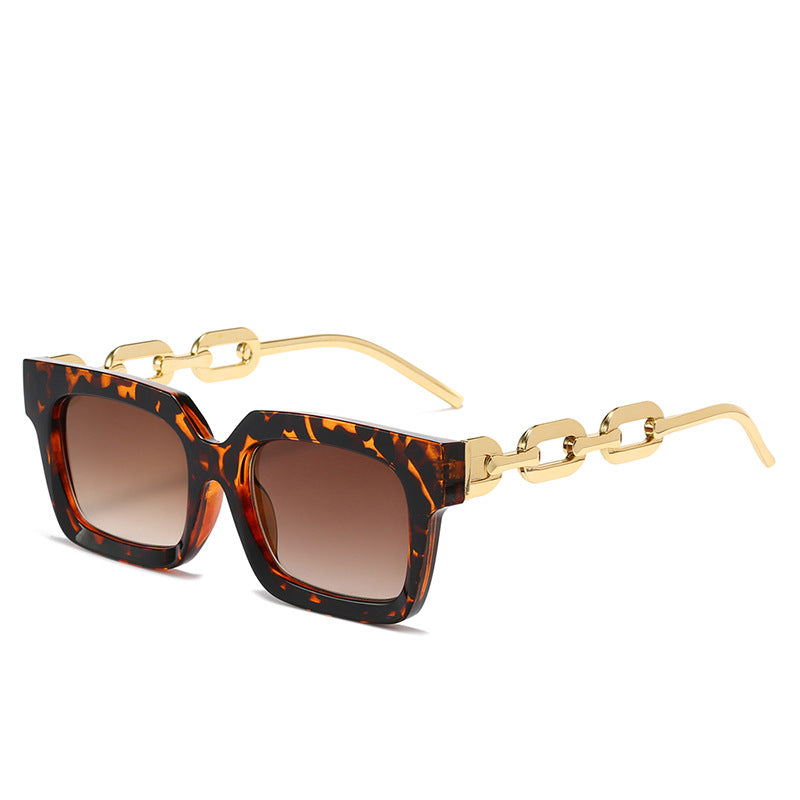 Dame moteriss solbrille med unikt kjedeelement Skanto