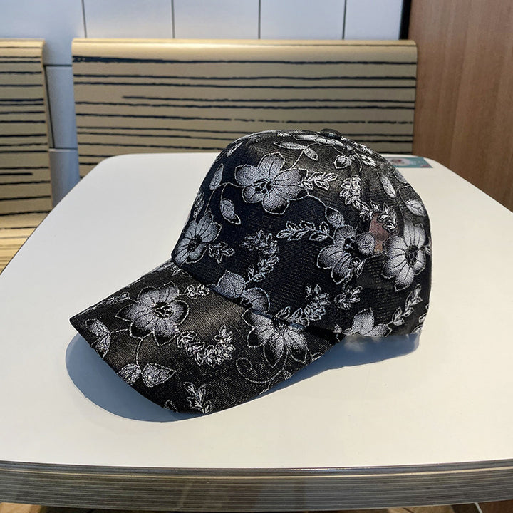 Kvinnens blomsterbroderte baseballcap Skanto