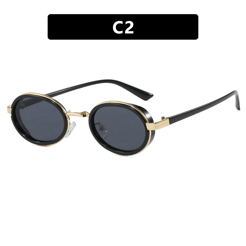 Dame rund solbrille med lette glass og gyldne detaljer Skanto