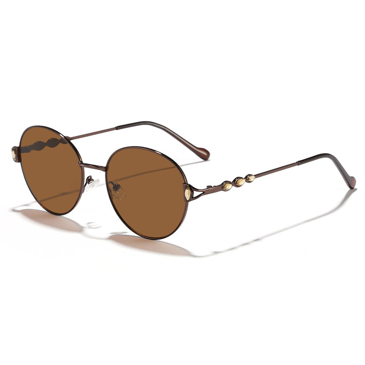 Dame rund solbrille med elegant metallramme og speilvendte glass Skanto