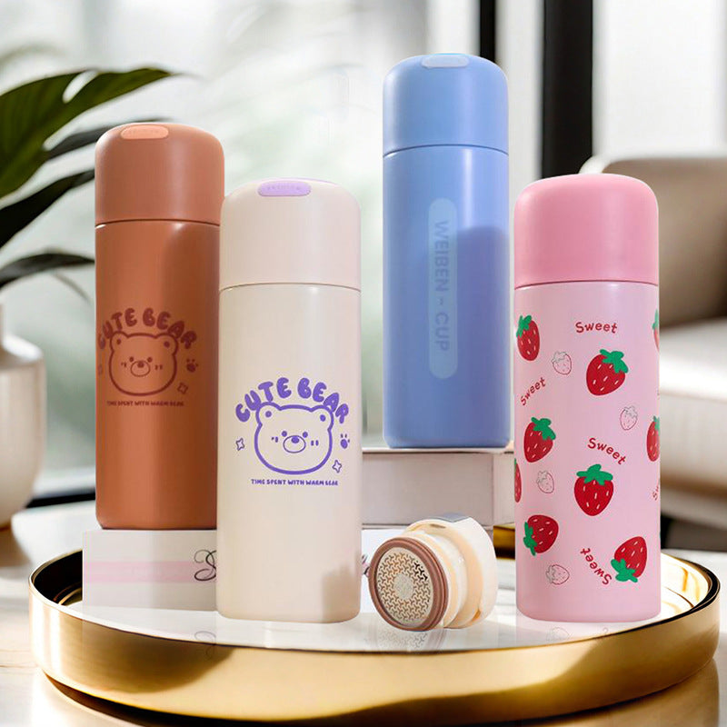 Dame Isolert Drikkeflaske med fruktig Design og ergonomisk Bærehandtak Skanto