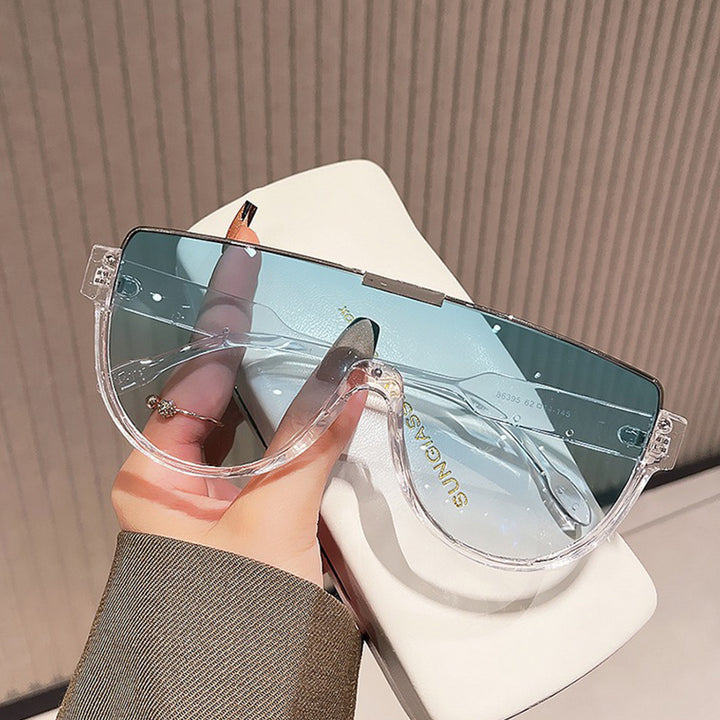 Dame Fashion-solbrille med futuristisk skjold-design Skanto