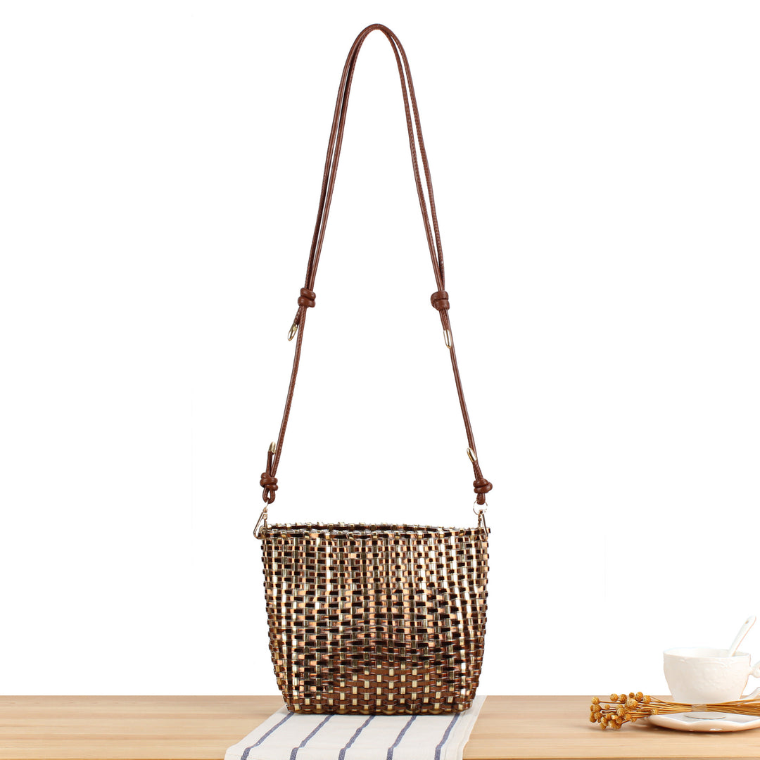 Shoulder bag made of hand-woven synthetic material with fashionable sliding mechanism Skanto