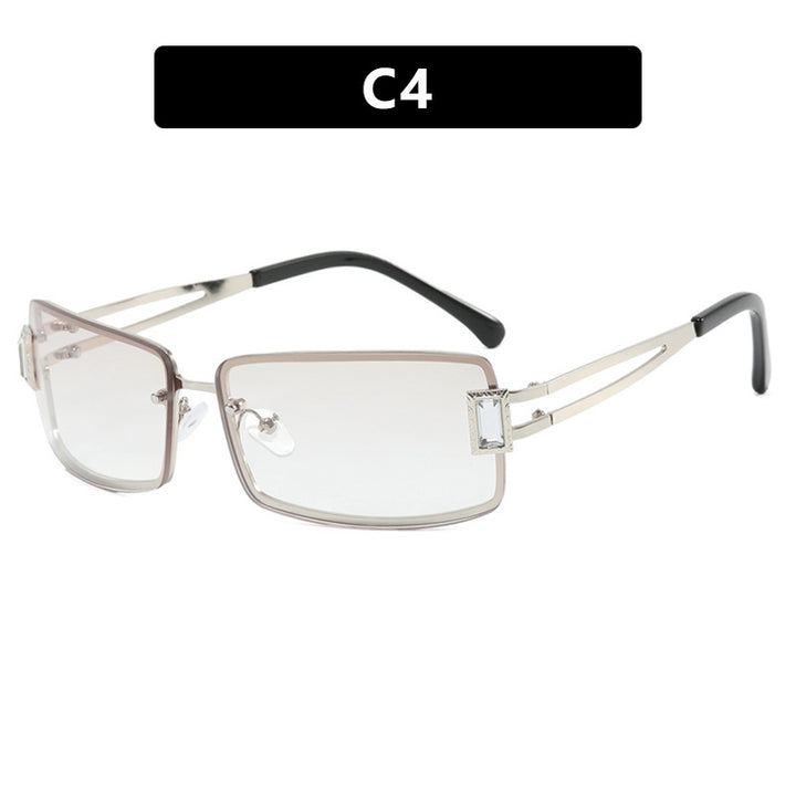 Dame stilig solbrille med elegante trapezformede glass og filigran metallramme Skanto