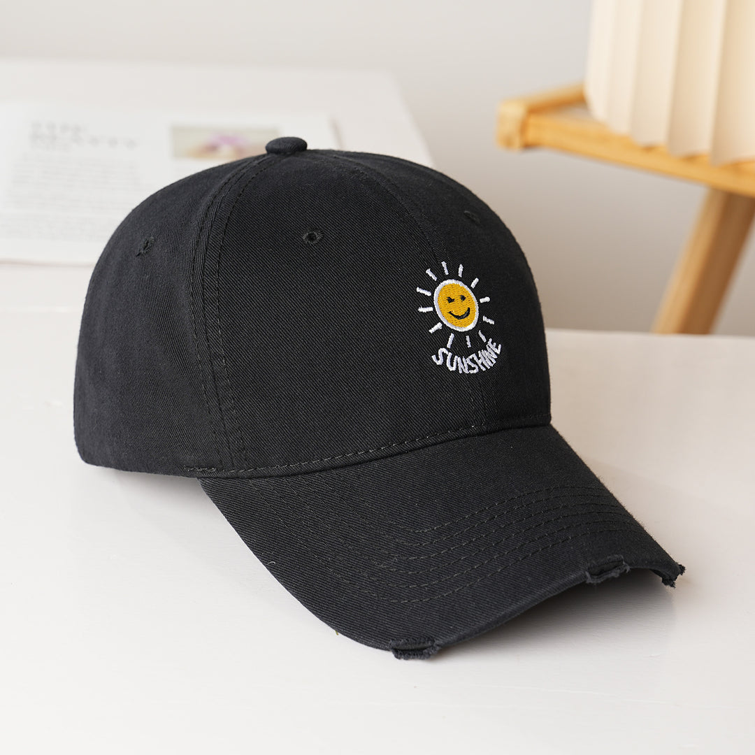Dame sporty bomullslue med solbroderi Skanto