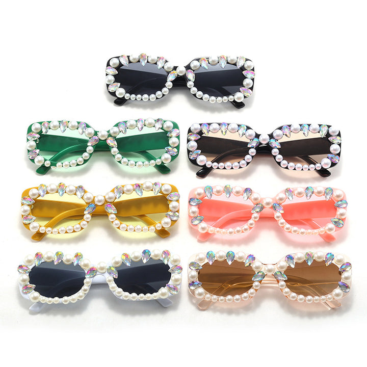 Damer elegant solbrille med perlepynt Skanto