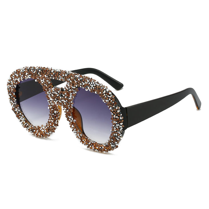 Dame moteriktig solbrille med glamorøse strassramme Skanto