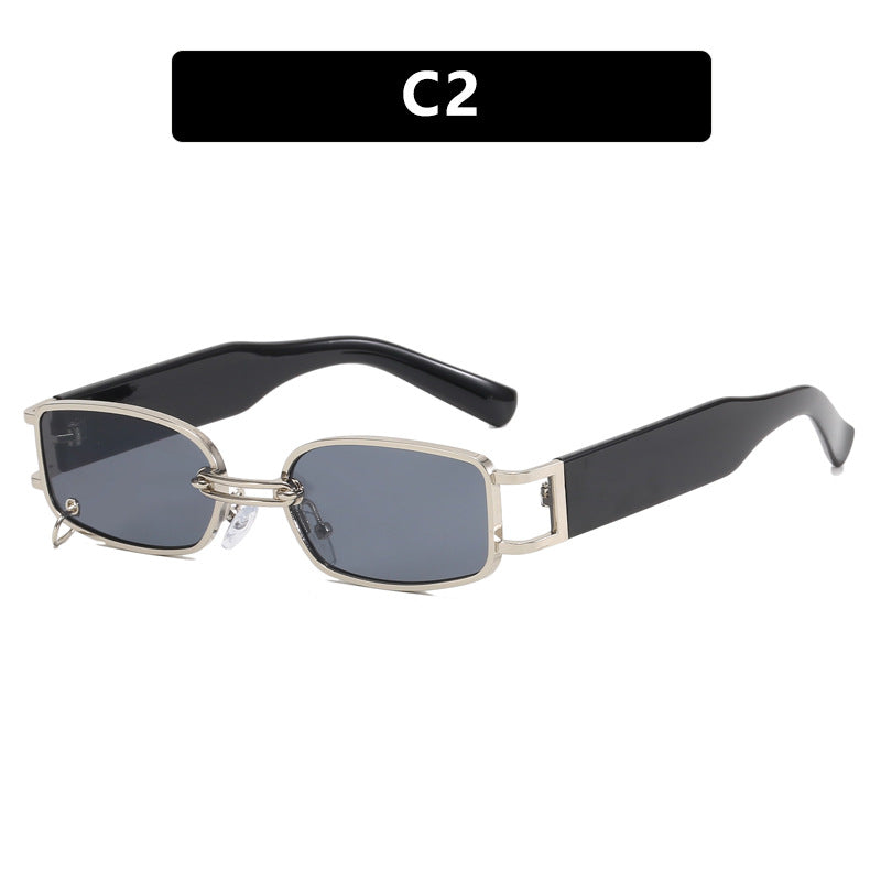 Dame moteriktig solbrille med innovativ rektangulær design og elegante metallakenter Skanto