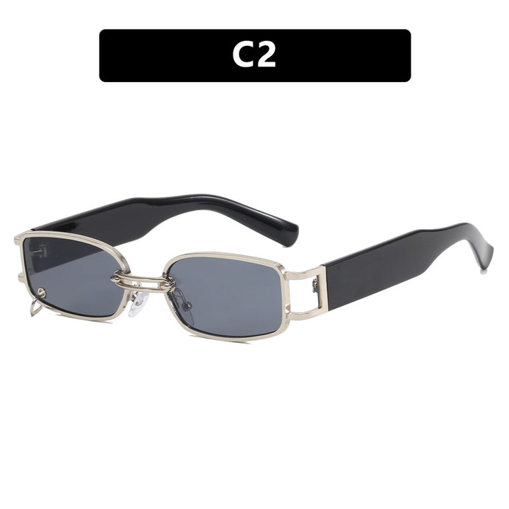 Dame moteriktig solbrille med innovativ rektangulær design og elegante metallakenter Skanto