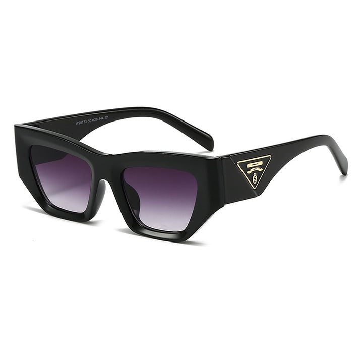 Dame Designer solbrille med moderne, geometrisk ramme Skanto