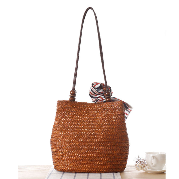 Elegant basket bag with stylish ribbon detail Skanto