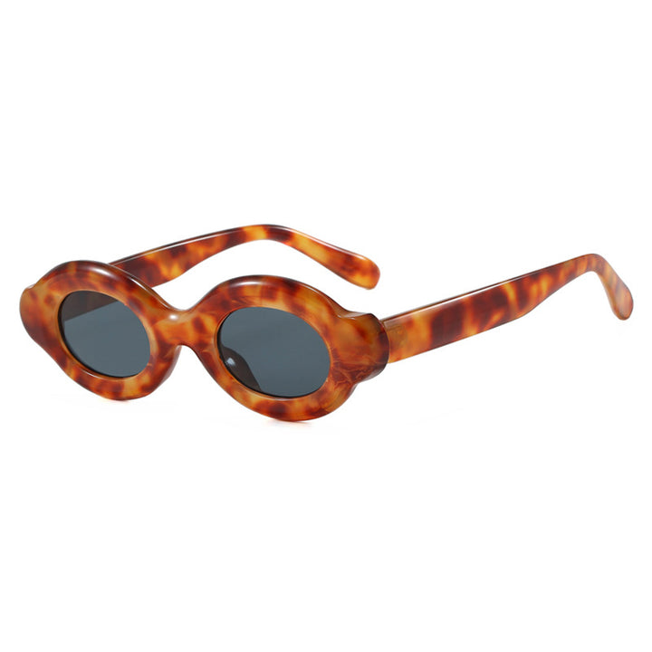 Dame solbrille i trendy retro-design med ovale glass Skanto