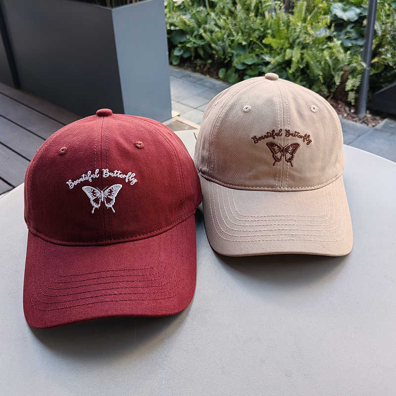 Kvinnens broderte sommerfugl caps Skanto