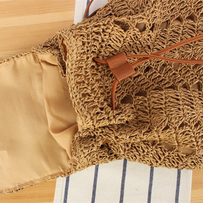 Backpack made of natural raffia with leather details Skanto