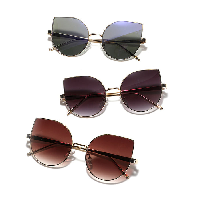Dame Cat-Eye solbriller med polariserte linser og elegant metalramme Skanto