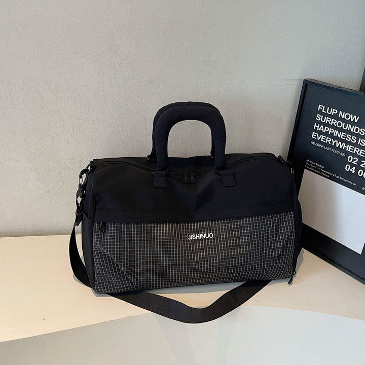 Sporty fritids-duffelbag med ergonomiske håndtak og flere rom Skanto