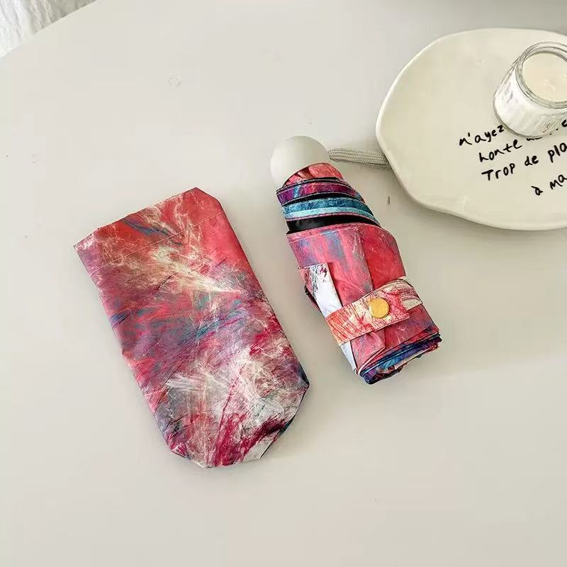 Dame sammenleggbart paraply med kreativt kunstdesign Skanto