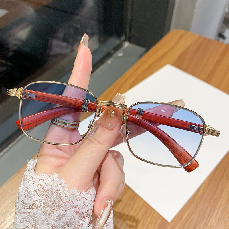 Dame solbrille med luksuriøs treinnfatning Skanto