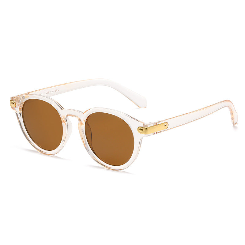 Dame moteriktig solbrille med transparent ramme og robuste glass Skanto