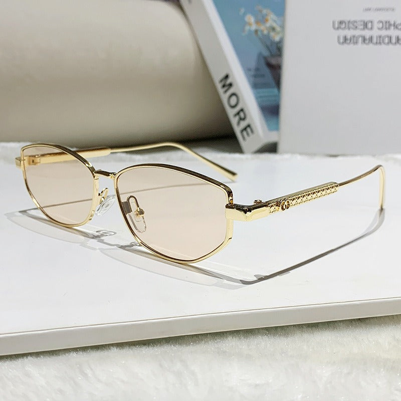Dame elegant solbrille med glitrende metallramme Skanto