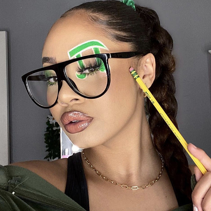 Dame trendy oversized solbriller med stilige transparente rammer Skanto
