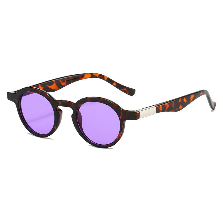 Dame eksklusiv solbrille i elegant skilpadde-design Skanto