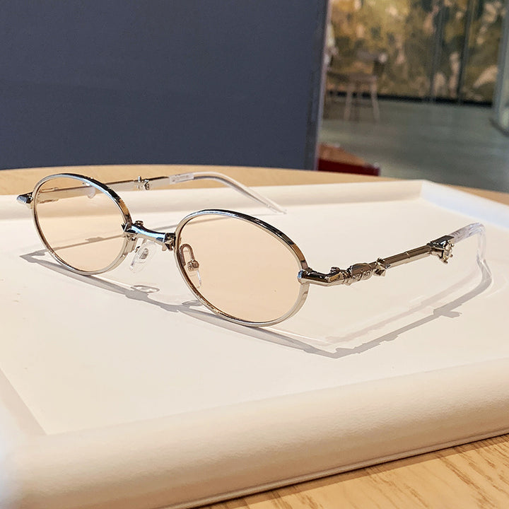 Dame moter briller med elegant metallramme og let fargede glass Skanto