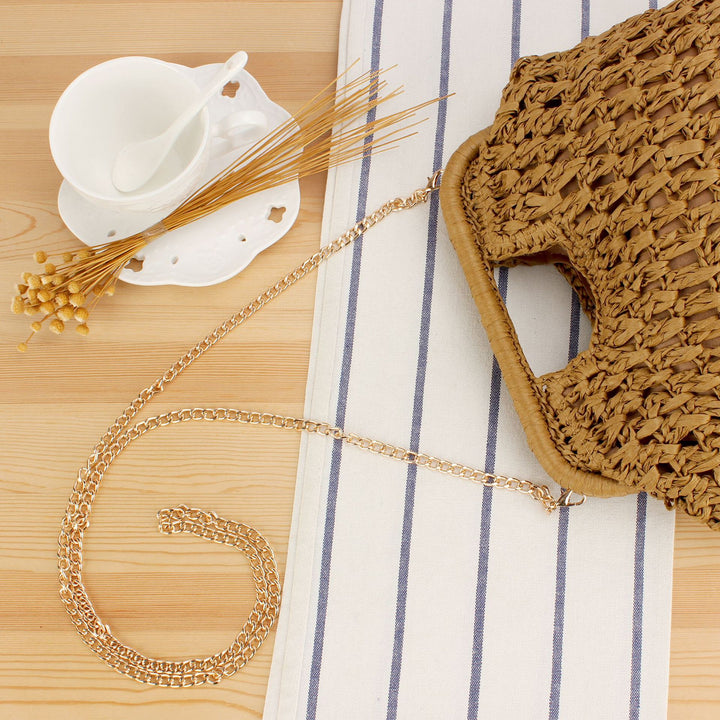 Beach shoulder bag made of natural weave with elegant chain decoration Skanto
